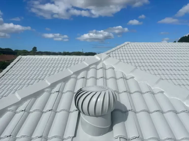 whirlybird roof vent on a white roof